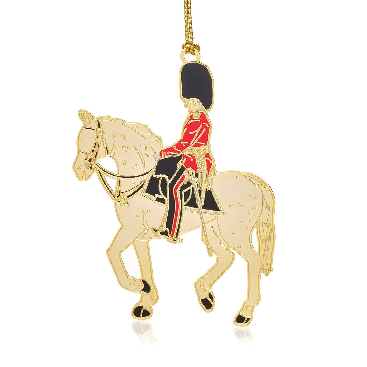 British Military Coldstream Guard Christmas Ornament featuring a gold-finished, brass mounted horse and soldier in traditional uniform. A luxurious holiday decoration inspired by the historic British regiment.