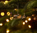 In a Christmas Tree - Handcrafted RAF Spitfire Christmas Tree Ornament, featuring intricate 24-carat gold detailing, celebrating British aviation history. Designed by The London Christmas Company.