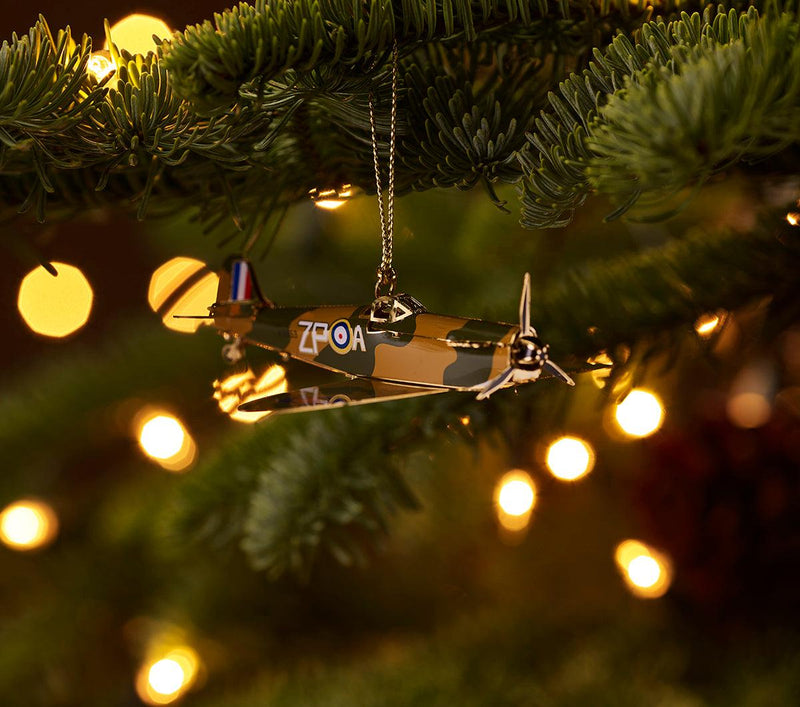 In a Christmas Tree - Handcrafted RAF Spitfire Christmas Tree Ornament, featuring intricate 24-carat gold detailing, celebrating British aviation history. Designed by The London Christmas Company.