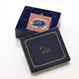 Inverted Jenny Stamp Christmas Ornament - USPS Replica by The London Christmas Company - Iconic U.S. Airmail Collectible Keepsake. Solid Brass and 24k Gold in a blue gift box!