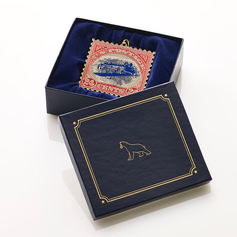 Inverted Jenny Stamp Christmas Ornament - USPS Replica by The London Christmas Company - Iconic U.S. Airmail Collectible Keepsake. Solid Brass and 24k Gold in a blue gift box!